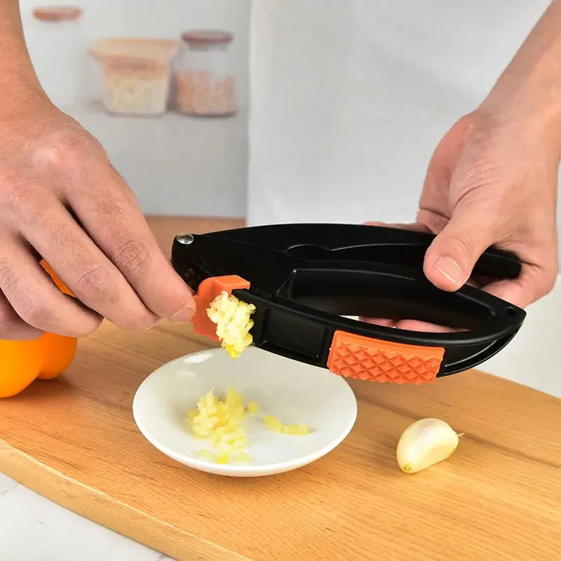 Multi-Functional Garlic Press and Peeler - Kitchen Tool