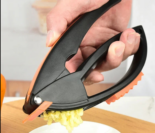 Multi-Functional Garlic Press and Peeler - Kitchen Tool